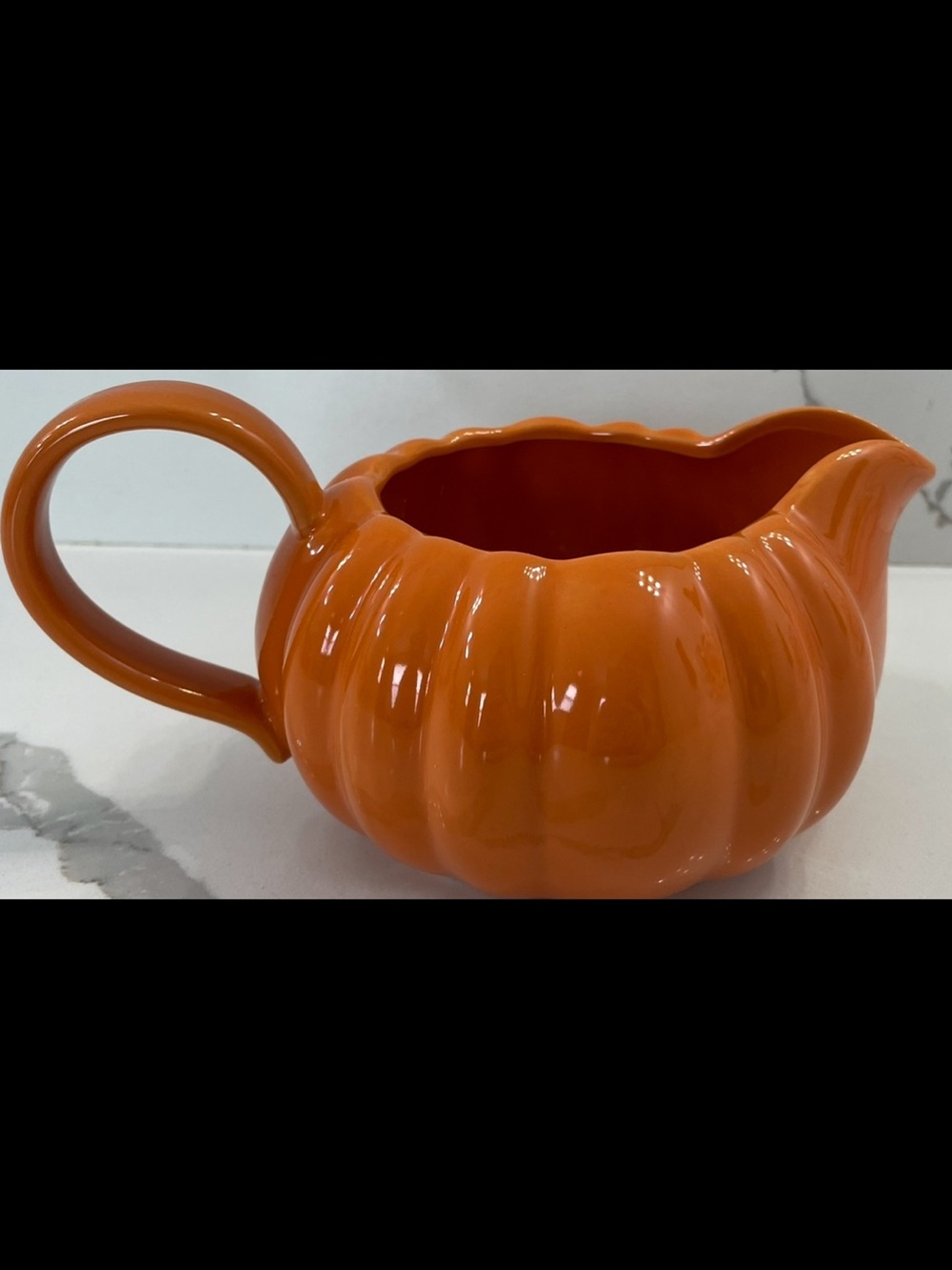 Croton Glossy Pumpkin-Shaped Ceramic Pitcher in Bright Orange